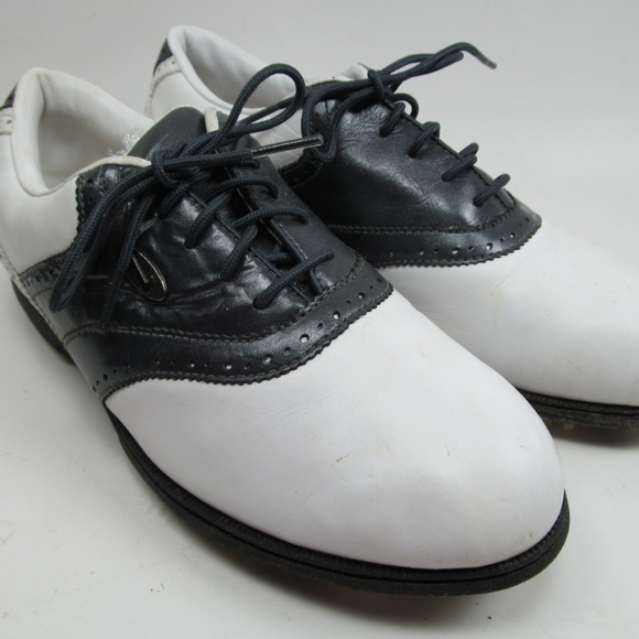 white leather golf shoes